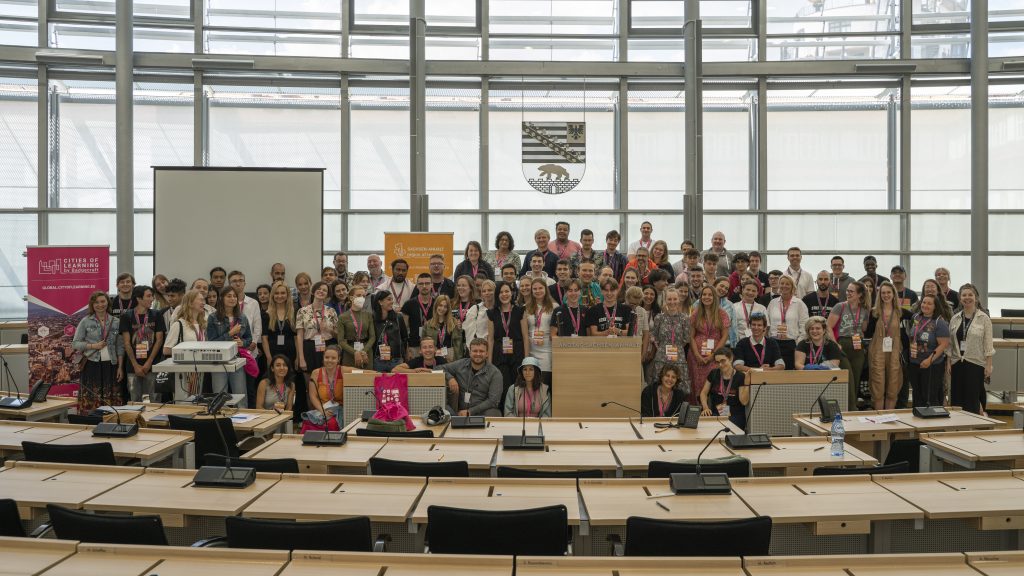 A group picture of young people in a building