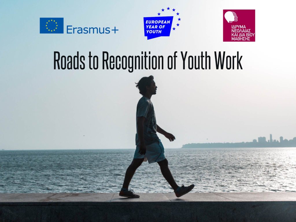 A young person is walking next to a sea. Above him is the text "Roads to Recognition of Youth Work" and the logos of Erasmus+, European Year of Youth, and Erasmus+ Greece